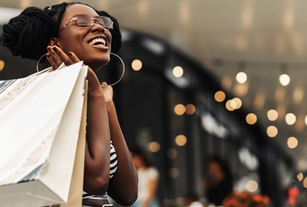 in the mall with shopping bags