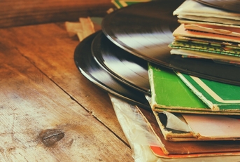 vintage record stake on wooden table