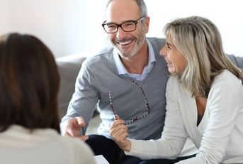 senior couple meeting financial adviser