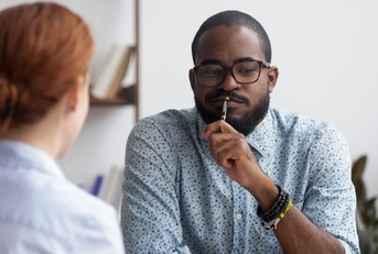 african american boss interviewing female candidate