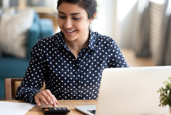 millennial indian woman paying bills