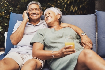 senior couple on outdoor lounge