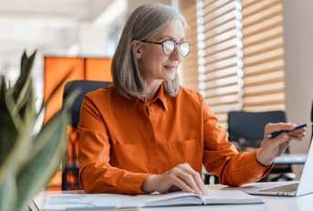 senior business woman working on laptop