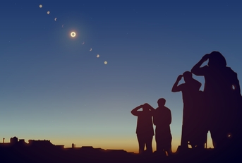people watching solar eclipse