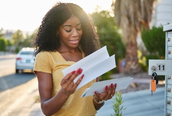 woman checking mail