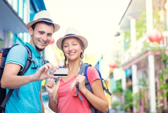 A couple using a credit card