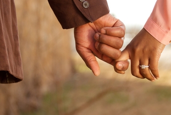 african american couple holding hands