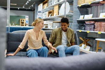 couple choosing sofa