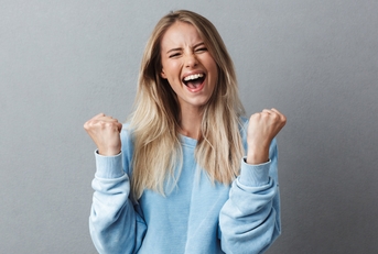 happy girl celebrating success
