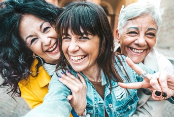 senior female friends enjoying on trip