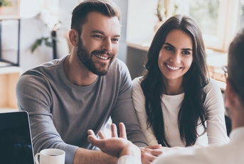 Couple talking to a financial advisor