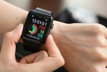 woman touching apple watch