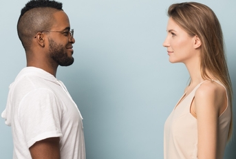 african man look at Caucasian woman