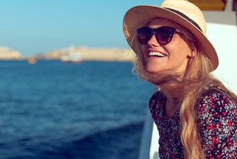 happy woman cruising ship