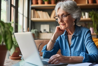 mature woman working on laptop
