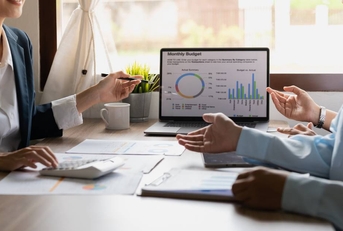 investment consultants analyzing financial reports