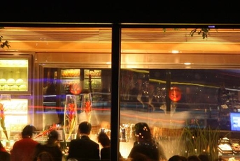 busy restaurant view from the outside window