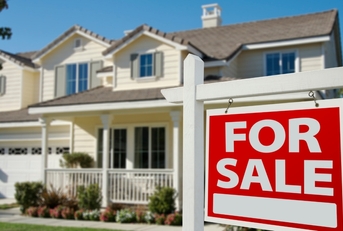 home for sale sign outdoors