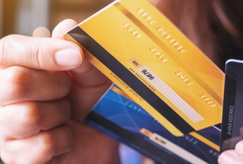 woman choosing credit card