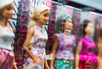 barbie dolls on store shelf