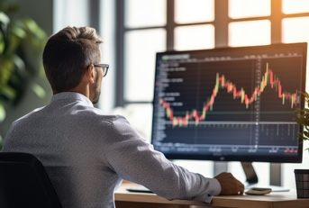 man watching stocks chart