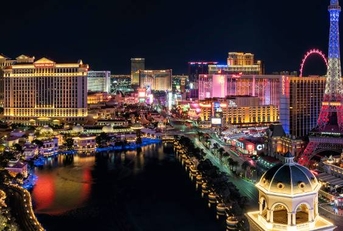 the las vegas skyline lit up at night