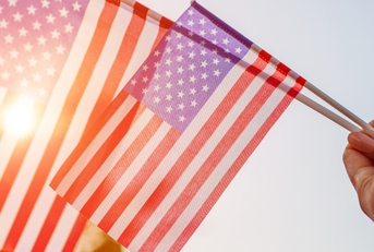 woman holding usa flag