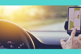 A driver uses a map on their phone