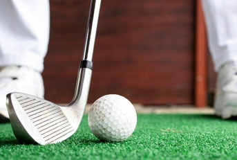 golfer preparing to hit the ball