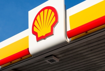 shell sign against blue sky