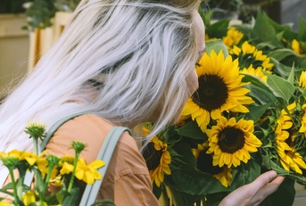 woman buying fresh flowers
