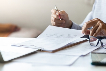 businessman reviewing document reports