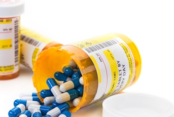 prescription medication in pharmacy vials