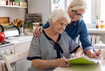 elderly mother with paperwork