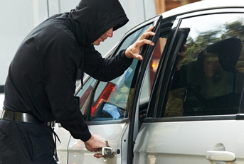 thief burglar at automobile car