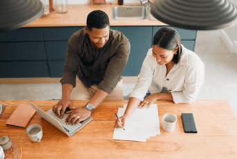 A couple reviews their finances together.