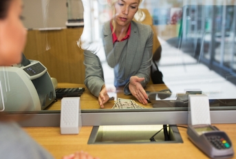 woman at the bank teller