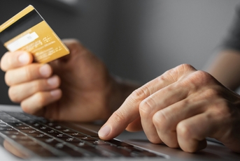 man hand holding credit card