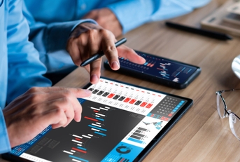 Businessman analyzing investment stock market