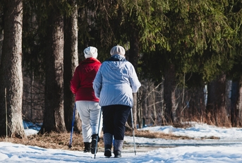 Senior women walking in the snow