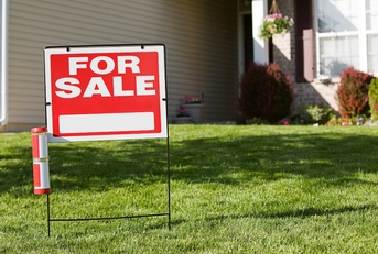 sign in front of home
