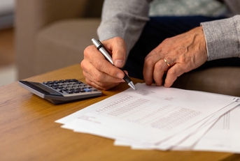 senior man with papers 