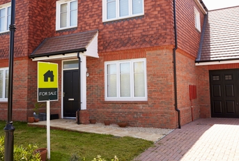 exterior of house with sold sign