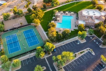 community center with tennis court and pool