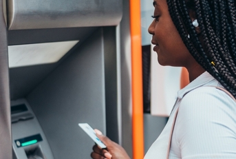Woman using an ATM