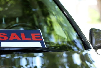 For sale sign on windshield