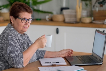 senior woman using laptop