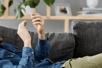 person playing game on phone