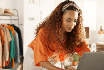 small business owner using laptop