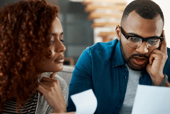Couple looking at budget